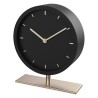 Επιτραπέζιο αναλογικό ρολόι με μεταλλική βάση.